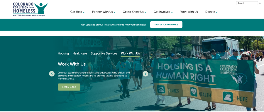 Colorado Coalition for the Homeless "Work With Us" page with a hero photo of staff and volunteers marching in a parade behind a "Housing Is a Human Right" banner.